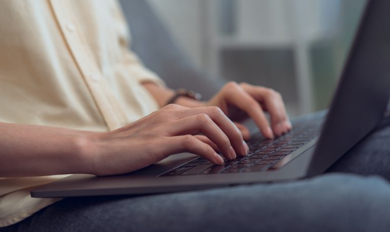 lady typing on laptop