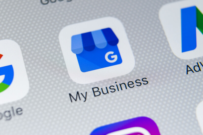 Google My Business application icon on Apple iPhone X screen close-up. Google My Business icon. Google My business application.