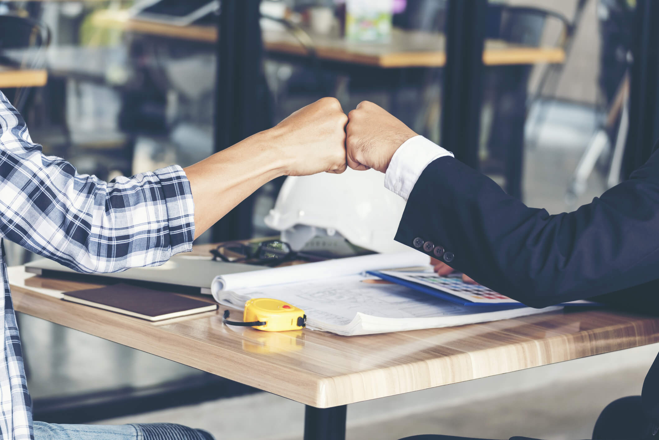 Business Partners Trust in Team Giving Fist Bump
