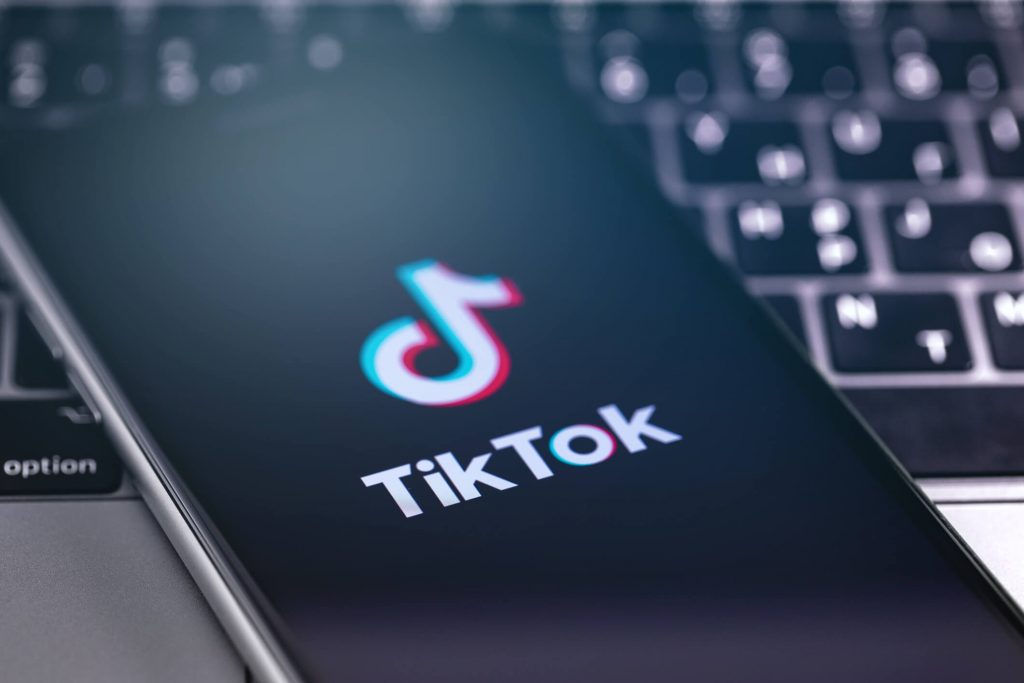 TikTok symbol on the display smartphone