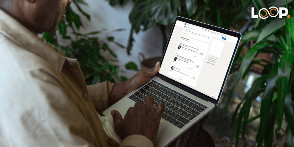 A man reviewing his Linkedin analytics